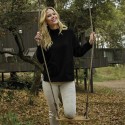 Jersey negro de punto con cuello cisne y bolsillos mujer mcm